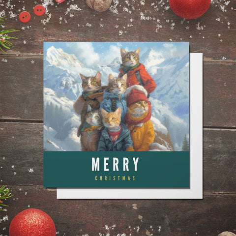 S.Golding Christmas Card | Cat Christmas Card | Cats dressed in coats on snowy mountain | Cat Xmas