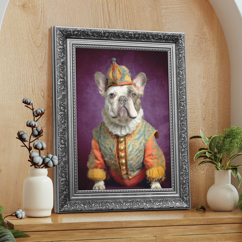 Framed portrait of a french bulldog dressed in a jester outfit, painted in a realistic style by S.Golding, displayed in a Silver frame on a wooden shelf