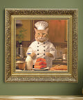 Chef cat wall art featuring a cat in chef uniform cooking in kitchen with ornate gold frame, vintage animal decor for UK home