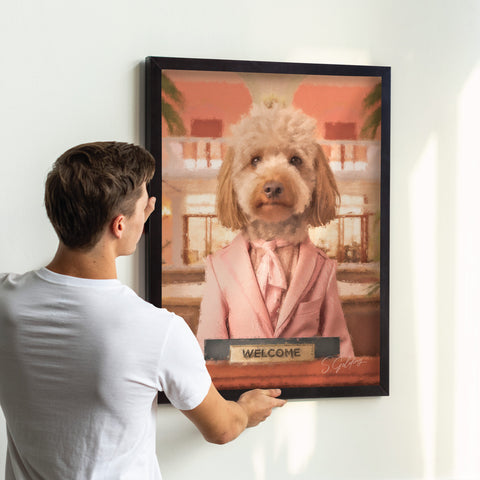 Labradoodle wall art portrait of a lady dog in a pink suit with a welcome sign in a A2 black frame being hung on a uk home wall