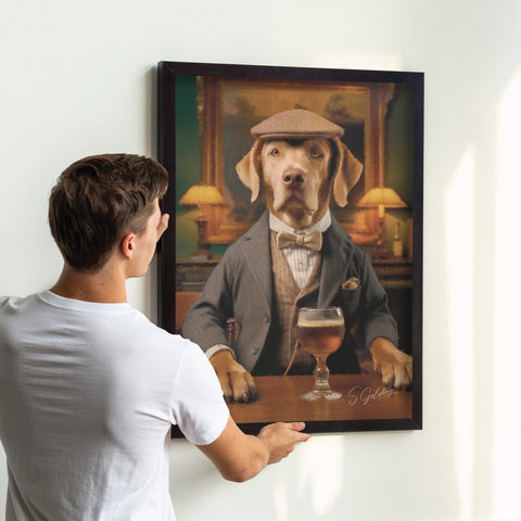 Dog wall art gentleman portrait being hung on wall in black frame, vintage animal decor for UK home