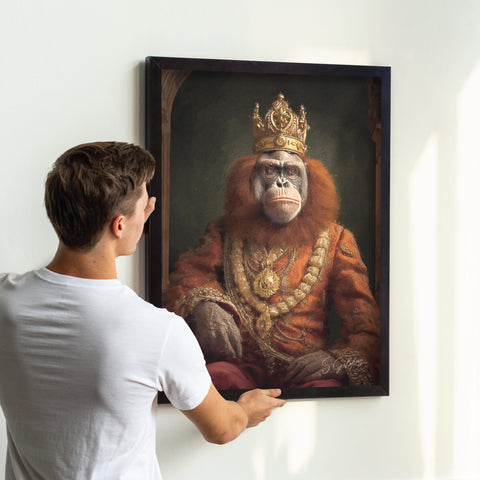 Orangutan king wall art featuring a royal monkey wearing crown and regal robes in black A2 frame, ready to hang animal portrait decor for UK home